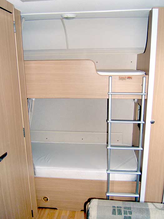 The fixed bunks to the rear of the caravan.